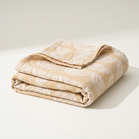 Tinyyytales muslin swaddle folded