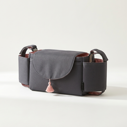 Tinyyytales stroller organiser showing pockets