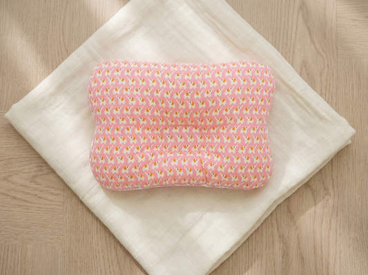 Tinyyytales head pillow flat lay on muslin