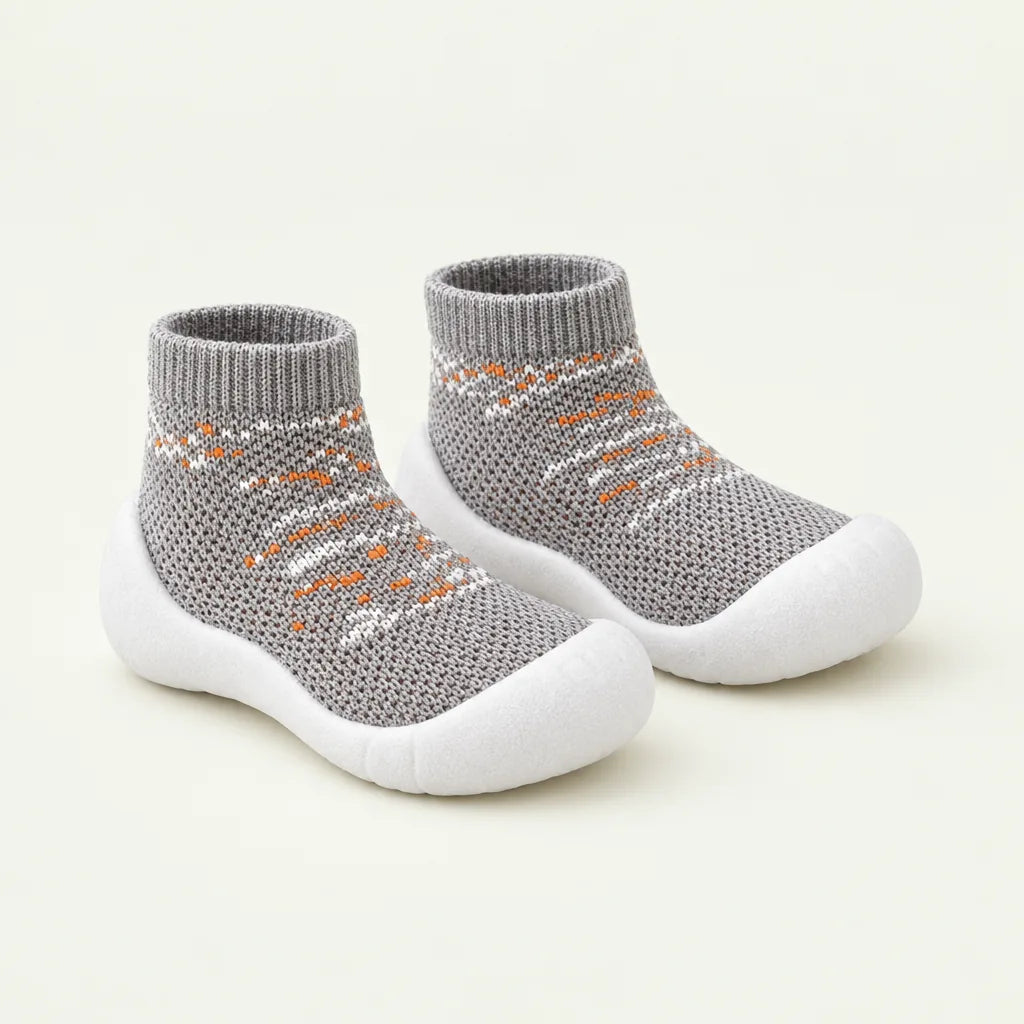 tinyyytales sock shoes in Pebble, pair side by side